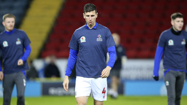 Blackburn Rovers defender Daniel Ayala (4) warming up in the Benefit Mankind T-Shirt during the EFL Sky Bet Championship match between Blackburn Rovers and Middlesbrough at Ewood Park, Blackburn, England on 29 December 2022.