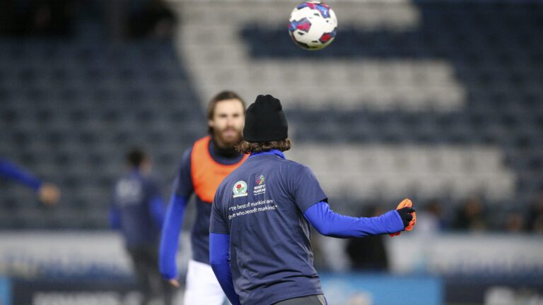 Blackburn Rovers midfielder Bradley Dack (23) warming up in the Benefit Mankind T-Shirt during the EFL Sky Bet Championship match between Blackburn Rovers and Middlesbrough at Ewood Park, Blackburn, England on 29 December 2022.